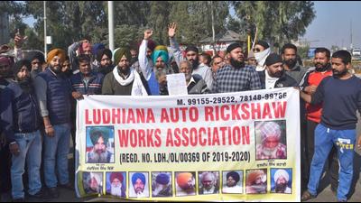 Members of the Ludhiana Auto Rickshaw Works Union staging a protest at Jagraon Bridge in Ludhiana on Friday. (Gurpreet Singh/HT) Members of the Ludhiana Auto Rickshaw Works Union staging a protest at Jagraon Bridge in Ludhiana on Friday. (Gurpreet Singh/HT)