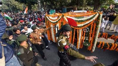 Funeral procession of late Chief of Defence Staff (CDS) Gen Bipin Rawat from his residence to Brar Square in Delhi cantonment, where he will be cremated with full military honours, in New Delhi, (PTI Photo) Funeral procession of late Chief of Defence Staff (CDS) Gen Bipin Rawat from his residence to Brar Square in Delhi cantonment, where he will be cremated with full military honours, in New Delhi, (PTI Photo)
