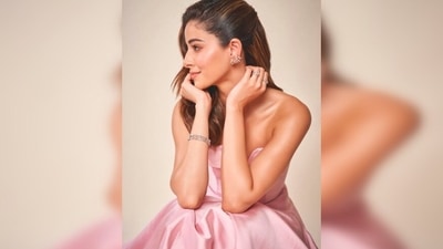For her hairdo, Ananya Panday opted for soft waves with a side parting and half hair brushed back. (Instagram/@ananyapanday)