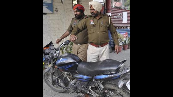 A case under Section 171 (wearing garb or carrying a public servant token with fraudulent intent) of the Indian Penal Code was registered against the motorcyclist at the Sadar police station in Ludhiana. (HT File Photo)