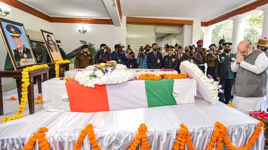Union Home Minister Amit Shah pays final tributes to CDS Gen Bipin Rawat, who passed away in an IAF chopper crash near Coonoor in Tamil Nadu on Wednesday, at his residence in New Delhi, Friday, Dec. 10, 2021.&nbsp;(Vijay Verma / PTI)