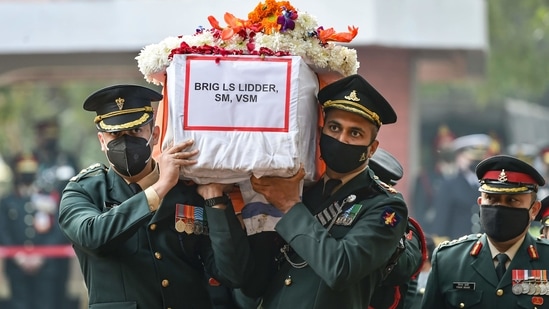 Mortal remains of late Brigadier LS Lidder being carried for cremation at Brar Square, Delhi Cantt, in New Delhi.(PTI)
