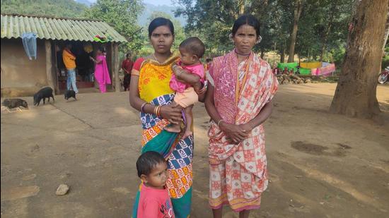 Sunita Digal of Gumudumaha village,(left) who lost her 13-month-old son in the 2016 Kandhamal police firing, cradling her 6-month-old daughter Manisha with Gadisi Digal, whose husband was killed in the firing. (HT Photo) Sunita Digal of Gumudumaha village,(left) who lost her 13-month-old son in the 2016 Kandhamal police firing, cradling her 6-month-old daughter Manisha with Gadisi Digal, whose husband was killed in the firing. (HT Photo)