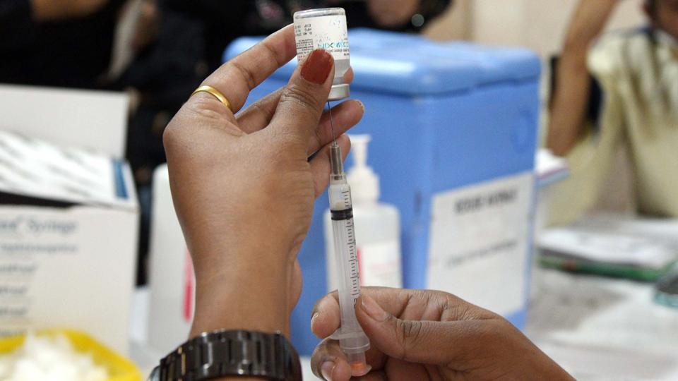 A Covid-19 vaccine shot being prepared at a camp in New Delhi, India. (HT/File)