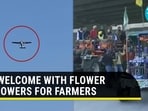 A welcome with flower showers for farmers