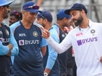 Mumbai: Indian team captain Virat Kohli with head coach Rahul Dravid after their victory in the 2-match test cricket series against New Zealand, at Wankhede stadium in Mumbai.