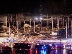 Emergency crews respond at a damaged Amazon.com, Inc warehouse after a tornado passed through Edwardsville, Illinois, US.