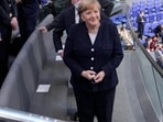 Merkel smiles from the guest box during her last day at the Bundestag(Jens Krick/Flashpic/picture alliance)