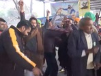 Farmers seen celebrate at Tikri border as they set off for their homes following a year-long protest.