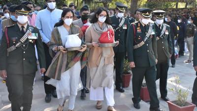 Ashes of Gen Bipin Rawat and his wife Madhulika being taken for immersion by their daughters at VIP Ganga Ghat in Haridwar on Saturday. (HT PHOTO.) Ashes of Gen Bipin Rawat and his wife Madhulika being taken for immersion by their daughters at VIP Ganga Ghat in Haridwar on Saturday. (HT PHOTO.)