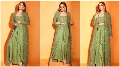 Sonakshi Sinha loves experimenting with her looks and has never failed to impress the fashion police with her style sense. Recently, the actor flooded her Instagram handle with photos of herself in a green embellished ensemble by ace designer Anamika Khanna. (Instagram/@aslisona) Sonakshi Sinha loves experimenting with her looks and has never failed to impress the fashion police with her style sense. Recently, the actor flooded her Instagram handle with photos of herself in a green embellished ensemble by ace designer Anamika Khanna. (Instagram/@aslisona)