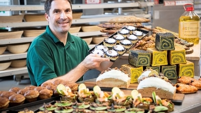 Baker Ludovic Gerboi has French roots. In this pic, he is posing with pastries made with algae.&nbsp; 