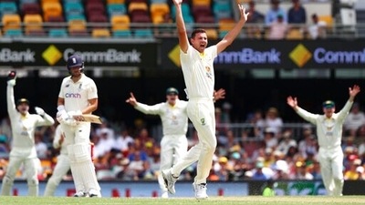 Australia's Josh Hazlewood appeals unsuccessfully for the wicket of England's Dawid Malan during day three of the first Ashes cricket test at the Gabba in Brisbane, Australia (AP) Australia's Josh Hazlewood appeals unsuccessfully for the wicket of England's Dawid Malan during day three of the first Ashes cricket test at the Gabba in Brisbane, Australia (AP)