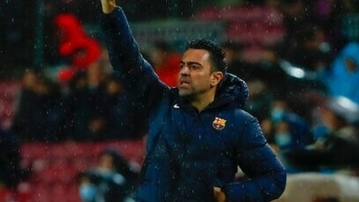 Barcelona's head coach Xavi Hernandez gestures during a Group E Champions League soccer match between FC Barcelona and Benfica at Camp Nou stadium in Barcelona. (AP) Barcelona's head coach Xavi Hernandez gestures during a Group E Champions League soccer match between FC Barcelona and Benfica at Camp Nou stadium in Barcelona. (AP)
