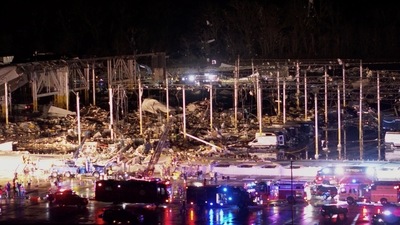 Emergency crews respond at a damaged Amazon.com, Inc warehouse after a tornado passed through Edwardsville, Illinois, US. (Chris Phillips via Reuters)