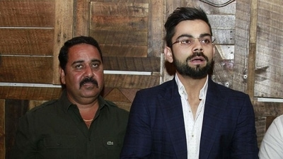 Rajkumar Sharma with Virat Kohli (Getty Images) Rajkumar Sharma with Virat Kohli (Getty Images)
