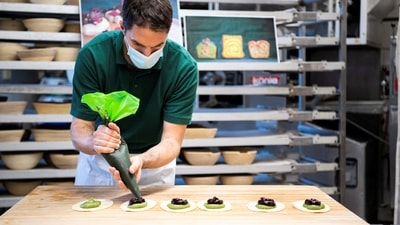 Baker Gerboin layers fruit paste over pureed algae to create a dessert in his Munich bakery. (Photo: Lukas Barth, Reuters)