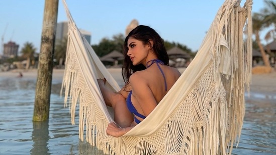 Striking sensuous poses for the camera, Mouni Roy set fans and fashion police drooling over her latest set of viral pictures.(Instagram/imouniroy)