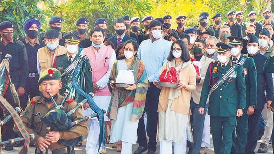 Daughters of late CDS General Bipin Rawat accompanied by several dignitaries arrive to immerse the ashes of their parents in the river Ganga, in Haridwar on Saturday. (ANI)