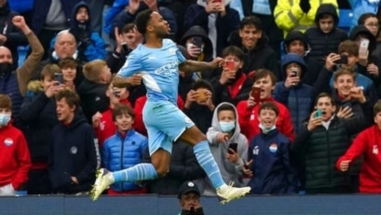 Manchester City's Raheem Sterling celebrates after scoring his side's first goal on a penalty kick during the English Premier League soccer match between Manchester City and Wolverhampton Wanderers, at the Etihad stadium.(AP) Manchester City's Raheem Sterling celebrates after scoring his side's first goal on a penalty kick during the English Premier League soccer match between Manchester City and Wolverhampton Wanderers, at the Etihad stadium.(AP)