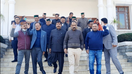 Leader of Opposition Mukesh Agnihotri along with Congress legislators staged a walk out on the second day of the Himachal Pradesh Vidhan Sabha winter session in Kangra on Saturday. (HT Photo)