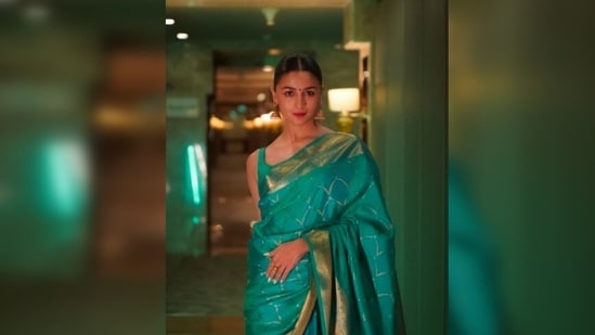 Alia Bhatt's makeup artist gave the actor a soft blushed look and for her hairdo, the actor opted for a sleek back low bun.(Instagram/@aliaabhatt)