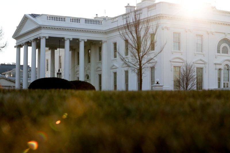 A general view of the sun rising behind the White House in Washington. (REUTERS)