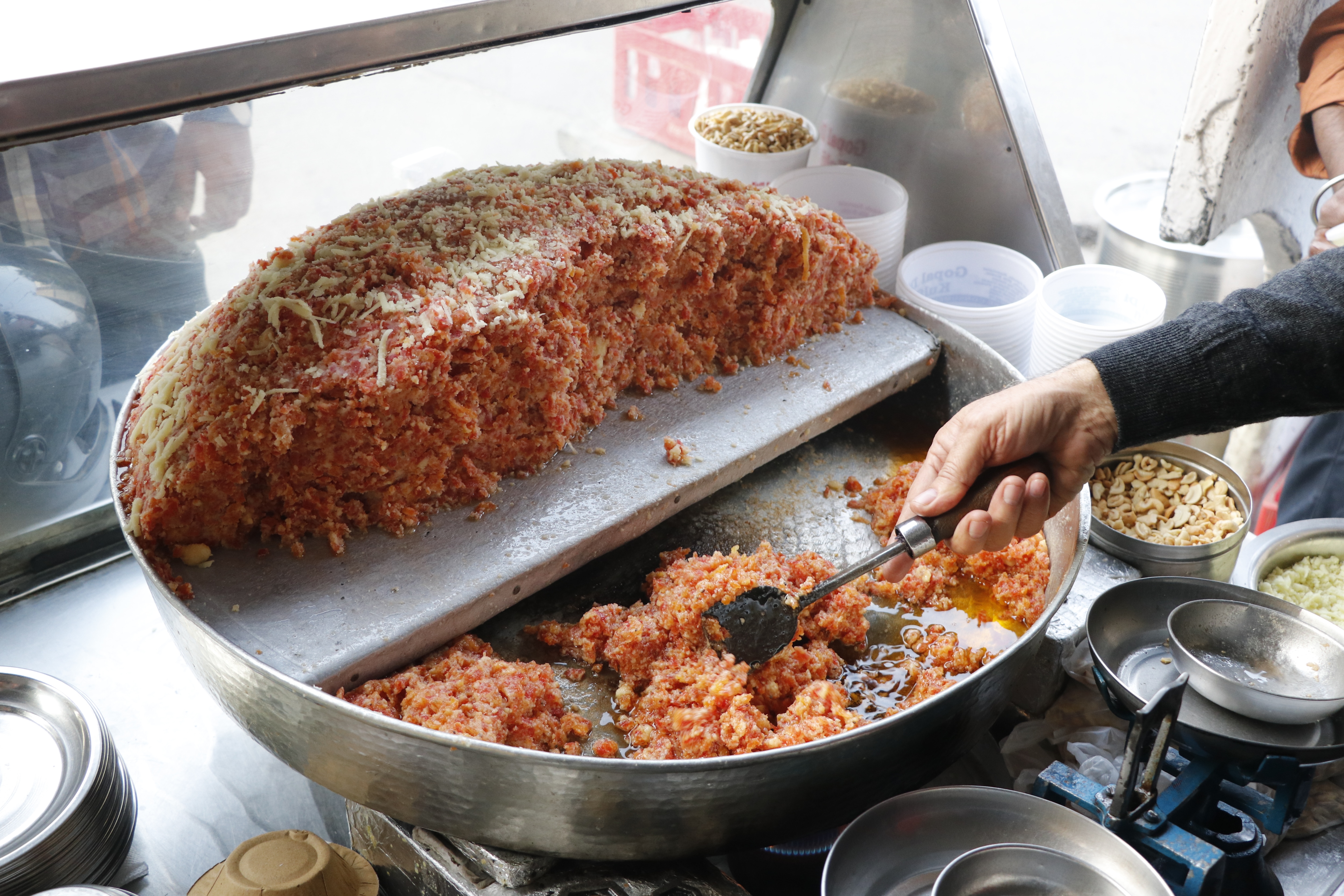 At Gopal Di Kulfi, near Liberty Cinema in Delhi, many queue up for Gajar ka Halwa during winters. (Photo: Dhruv Sethi/HT)