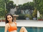 Manushi Chhillar's tangerine bikini pictures scream summer as she poses by pool(Instagram/manushi_chhillar) Manushi Chhillar's tangerine bikini pictures scream summer as she poses by pool(Instagram/manushi_chhillar)