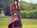 If there is one ensemble that is timeless and always in style, it has to be the midi dress and Bollywood actor Raveena Tandon was seen acing the same with elegance and grace.(Instagram/officialraveenatandon) If there is one ensemble that is timeless and always in style, it has to be the midi dress and Bollywood actor Raveena Tandon was seen acing the same with elegance and grace.(Instagram/officialraveenatandon)