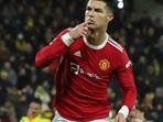 Manchester United's Cristiano Ronaldo celebrates scoring their first goal from the penalty spot.