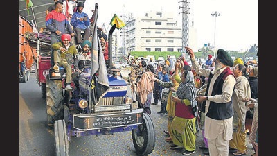 Celebrations and festivities, followed the farmers as they returned to Ludhiana after laying a long a long siege on the borders of New Delhi. People were seen dancing to the dhol and distributing sweets to celebrate the farmers’ homecoming. (Harsimar Pal Singh/HT) Celebrations and festivities, followed the farmers as they returned to Ludhiana after laying a long a long siege on the borders of New Delhi. People were seen dancing to the dhol and distributing sweets to celebrate the farmers’ homecoming. (Harsimar Pal Singh/HT)