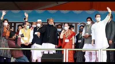Congress president Sonia Gandhi with Rajasthan Chief Minister Ashok Gehlot and party leaders Rahul Gandhi, Priyanka Gandhi Vadra, KC Venugopal and others waves to their supporters during the party rally against inflation, in Jaipur on Sunday. (ANI)