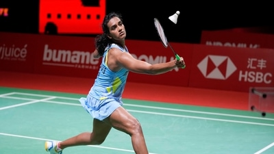 India's Pusarla V. Sindhu competes against South Korea's An Se-young during their women's singles badminton final match at the BWF World Tour Finals in Nusa Dua, Bali. (AP)