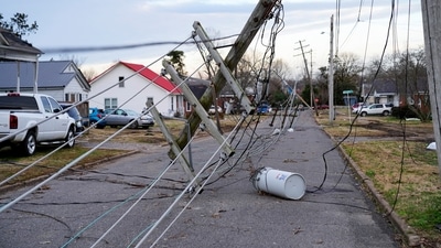 A downed power line is seen after a devastating outbreak of tornadoes ripped through several US states in Mayfield, Kentucky, US. (REUTERS)