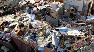 In Kentucky alone, 22 were confirmed dead by late Saturday, including 11 in and around Bowling Green. (REUTERS)
