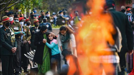 Family members of Lt Colonel Harjinder Singh, who died in the Coonoor chopper crash, perform his last rites at Brar Square in New Delhi on Sunday. (PTI) Family members of Lt Colonel Harjinder Singh, who died in the Coonoor chopper crash, perform his last rites at Brar Square in New Delhi on Sunday. (PTI)