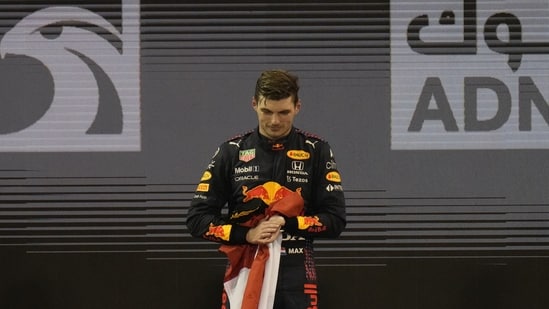 Dutch Red Bull driver Max Verstappen stepped onto the podium after becoming world champion after winning the Abu Dhabi Formula 1 Grand Prix in Abu Dhabi, United Arab Emirates on Sunday, December 12, 2021 . (AP Photo / Hassan Ammar)