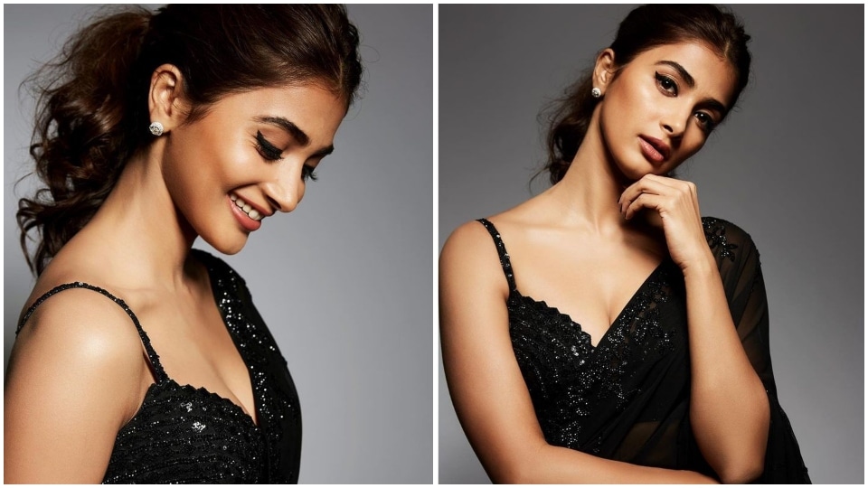 Pooja Hegde wears a spaghetti-strapped blouse with her saree.&nbsp;