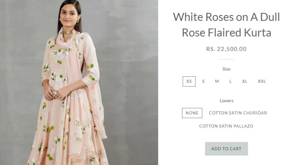The White Roses on A Dull Rose Flaired Kurta. (picchika.in) The White Roses on A Dull Rose Flaired Kurta. (picchika.in)