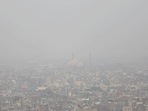 Smog over the national Capital. The government on Monday said the air pollution levels in Delhi have improved, and that it will ask CAQM to reopen schools in a phased manner. (Sanchit Khanna/HT Photo) Smog over the national Capital. The government on Monday said the air pollution levels in Delhi have improved, and that it will ask CAQM to reopen schools in a phased manner. (Sanchit Khanna/HT Photo)