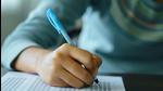 Close up of high school or university student holding a pen writing on answer sheet paper in the examination room. College students answering multiple choice questions test in the testing room in university. (Getty Images/iStockphoto) Close up of high school or university student holding a pen writing on answer sheet paper in the examination room. College students answering multiple choice questions test in the testing room in university. (Getty Images/iStockphoto)