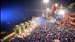 Devotees take part in the evening 'Aarti' ritual at Dashashwamedh Ghat on the banks of river Ganges during the inauguration of Kashi Vishwanath Dham Corridor in Varanasi on Monday. (AFP) Devotees take part in the evening 'Aarti' ritual at Dashashwamedh Ghat on the banks of river Ganges during the inauguration of Kashi Vishwanath Dham Corridor in Varanasi on Monday. (AFP)