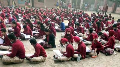 Irate parents said that the least the school authorities could have done was provide them with mats and carpets and have the area cleaned before seating the students. (HT Photo) Irate parents said that the least the school authorities could have done was provide them with mats and carpets and have the area cleaned before seating the students. (HT Photo)