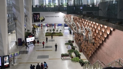 Passengers at Terminal 3 of Delhi Indira Gandhi International airport. (PTI) Passengers at Terminal 3 of Delhi Indira Gandhi International airport. (PTI)