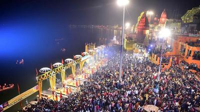 Devotees take part in the evening 'Aarti' ritual at Dashashwamedh Ghat on the banks of river Ganges during the inauguration of Kashi Vishwanath Dham Corridor in Varanasi on Monday. (AFP) Devotees take part in the evening 'Aarti' ritual at Dashashwamedh Ghat on the banks of river Ganges during the inauguration of Kashi Vishwanath Dham Corridor in Varanasi on Monday. (AFP)