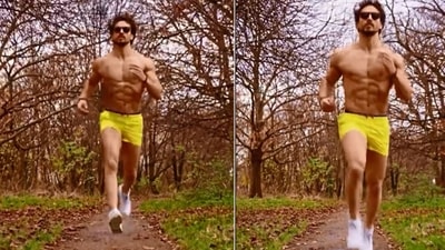 Tiger Shroff running in a park. Tiger Shroff running in a park. 