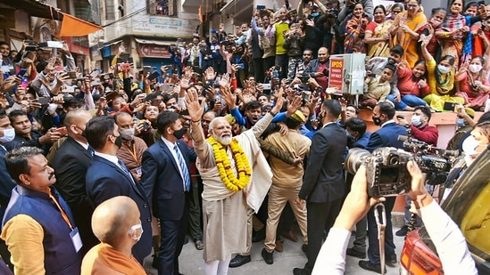 Prime Minister Narendra Modi greets people in his parliamentary constituency, in Varanasi.(PTI) Prime Minister Narendra Modi greets people in his parliamentary constituency, in Varanasi.(PTI)