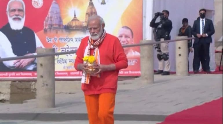 Prime Minister Narendra on his way to Ganga river in Varanasi. (ANI)