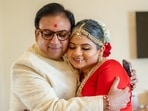 Dilip Joshi and his daughter Niyati share an emotional moment at her wedding. Dilip Joshi and his daughter Niyati share an emotional moment at her wedding.